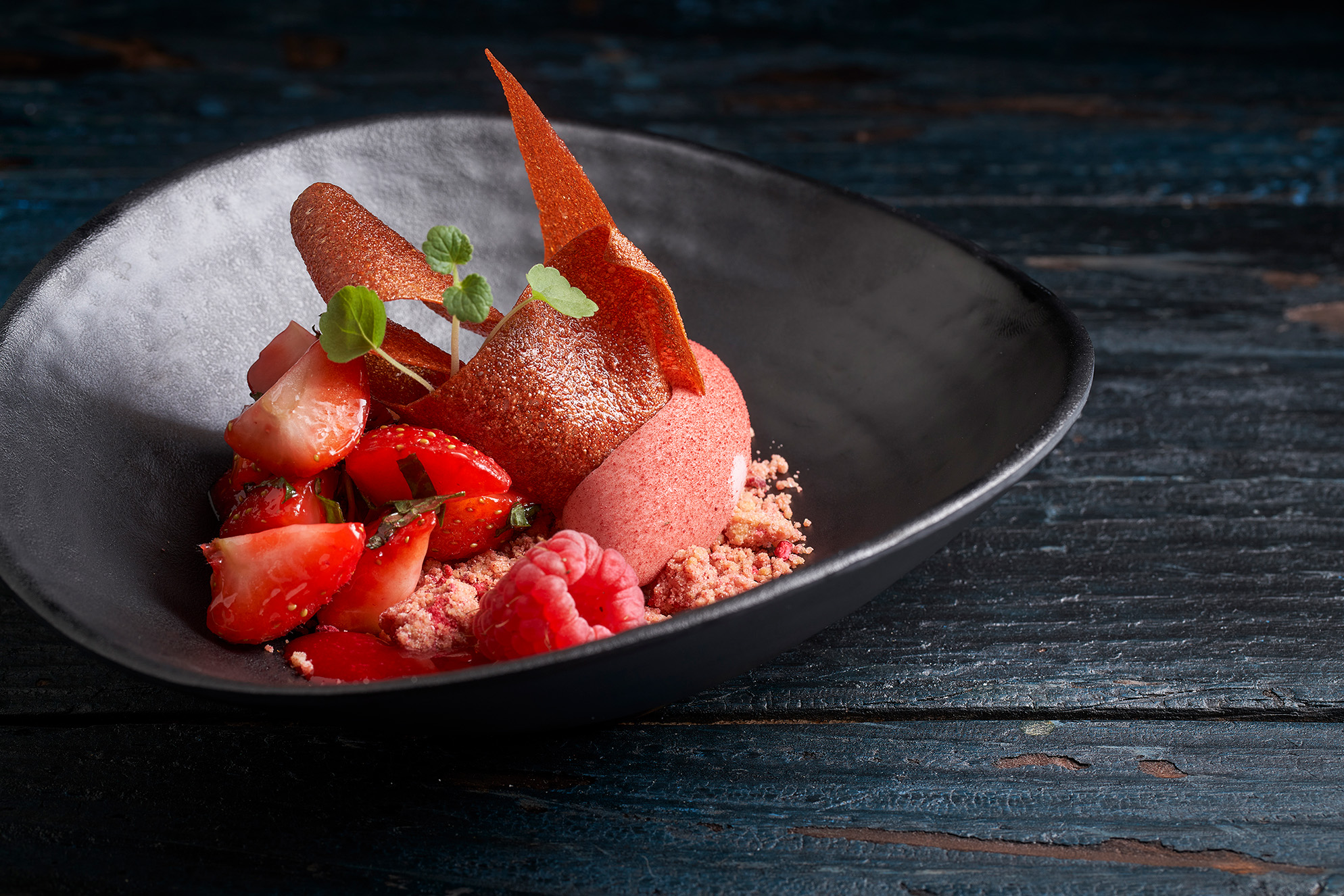 Dessert with strawberry and raspberry structures